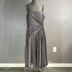 Unique grey dress with gorgeous skirt and design.  Fits size 14